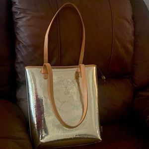 Authentic Consuela Goldie gold tote bag.